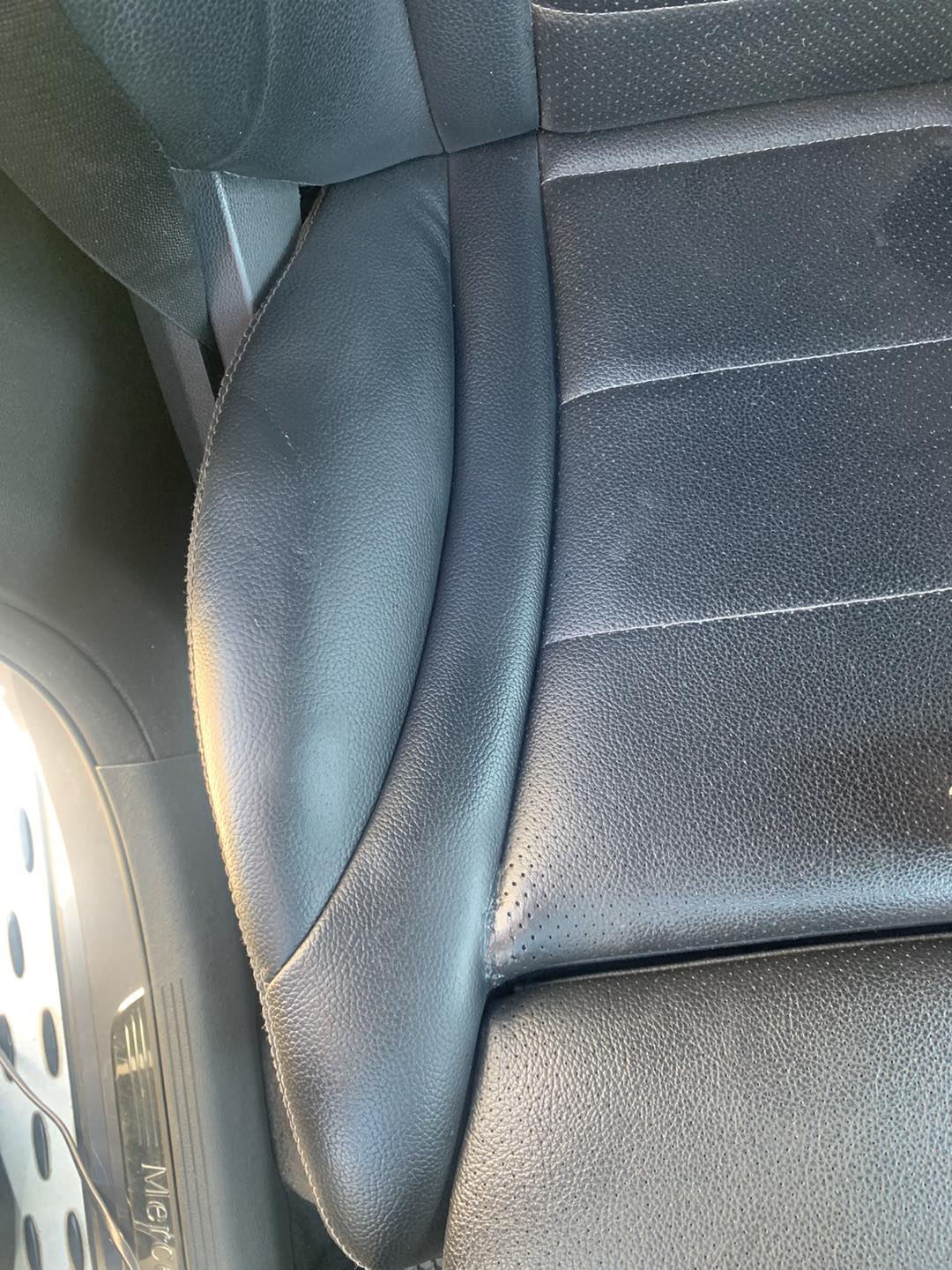 Car seat after professional faux leather repair and recolouring